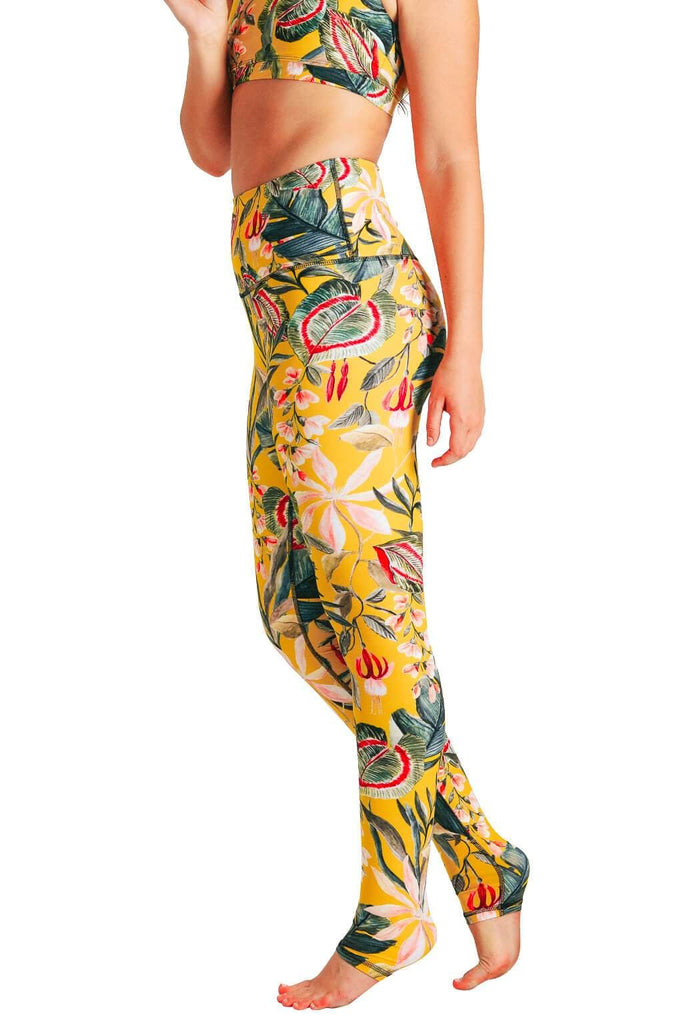 Yoga Democracy Women's Eco-friendly yoga full length leggings in Curry Up yellow with floral print. USA made from post-consumer recycled plastic bottles. Sweat wicking, anti-microbial, and quick dry ultra-soft brushed fabric.