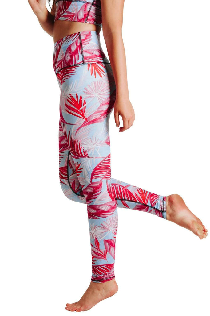 Yoga Democracy Women's Eco-friendly yoga pants leggings in Hot Tropic Flamingo pink and baby blue print. USA made from post-consumer recycled plastic bottles. Sweat wicking, anti-microbial, and quick dry ultra-soft brushed fabric.