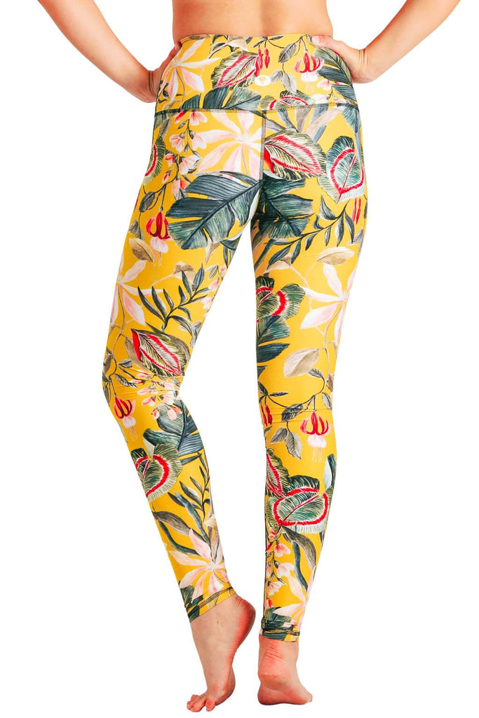 Yoga Democracy Women's Eco-friendly yoga full length leggings in Curry Up yellow with floral print. USA made from post-consumer recycled plastic bottles. Sweat wicking, anti-microbial, and quick dry ultra-soft brushed fabric.