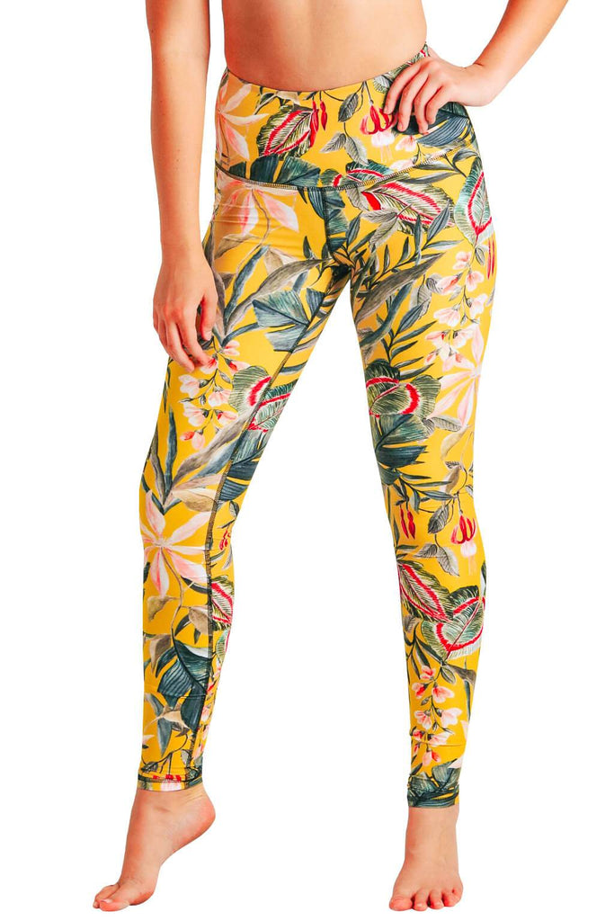 Yoga Democracy Women's Eco-friendly yoga full length leggings in Curry Up yellow with floral print. USA made from post-consumer recycled plastic bottles. Sweat wicking, anti-microbial, and quick dry ultra-soft brushed fabric.