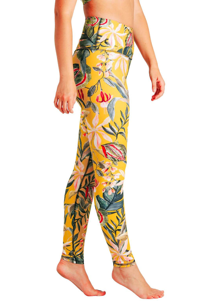 Yoga Democracy Women's Eco-friendly yoga full length leggings in Curry Up yellow with floral print. USA made from post-consumer recycled plastic bottles. Sweat wicking, anti-microbial, and quick dry ultra-soft brushed fabric.